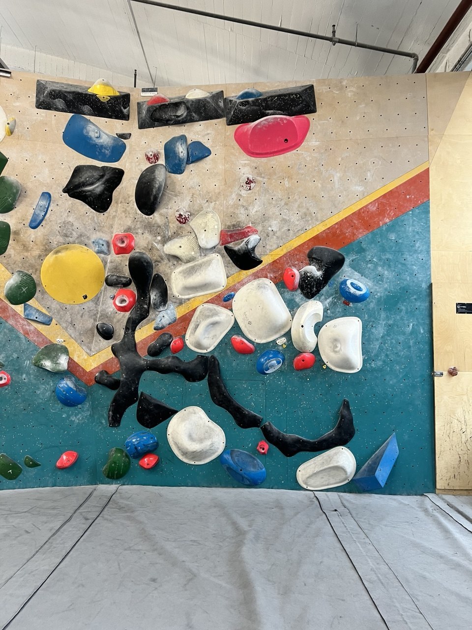 A bouldering wall photographed with Topra's in-app camera, ready for hold tagging.